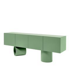 a green console table with three drawers