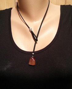 NECKLACES GEMSTONE HERE: https://www.etsy.com/shop/SofronKutStar?ref=seller-platform-mcnav§ion_id=32534750 *Material: Leather, stone pendant and silver plated beads. Carnelian is available in other models in our store: SHIPPING METHOD : Purchased item will be delivered by mail, will be sent via Priority Mail. Tracking number will be provided as soon as the items is shipped. * Delivery time can vary according to Your location. If you have any questions, please do not hesitate to contact me. Thank Adjustable Lariat Necklace With Natural Stones, Adjustable Lariat Jewelry With Natural Stones, Adjustable Gemstone Choker, Brown Necklace With Sliding Knot For Gift, Adjustable Spiritual Lariat Jewelry, Gemstone Lariat Long Necklace As A Gift, Adjustable Gemstone Dangle Necklace, Adjustable Gemstone Choker Necklace, Adjustable Crystal Necklace With Natural Stones