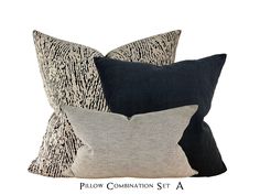 three pillows with black and white designs on them