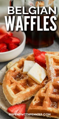 waffles on a plate with strawberries and syrup in the background text reads how to make belgium waffles