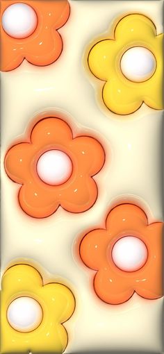 an orange and yellow flower pattern is shown in this image, it appears to be floating or floating on the water