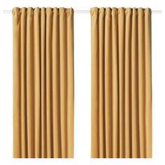 yellow curtains hanging on a white wall