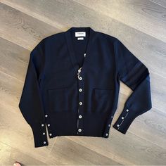 Brand New, Nwt Thom Browne Navy Blue Tweed-Trimmed Merino Wool Cardigan. 100% Merino Wool. Made In Italy. Measurements In Photos. Bought Off Outnet, Only Came With Their Tags, Did Not Come With Thom Browne Tag. 100% Authentic. Brand: Thom Browne Size: 4 Condition: Nwt Msrp: $1590 Luxury Cardigan For Workwear, Luxury V-neck Outerwear With Button Closure, Designer V-neck Cardigan For Work, Designer Fitted Cardigan For Workwear, Thom Browne Sweater, Blue Tweed, Merino Wool Cardigan, Wool Cardigan, Thom Browne