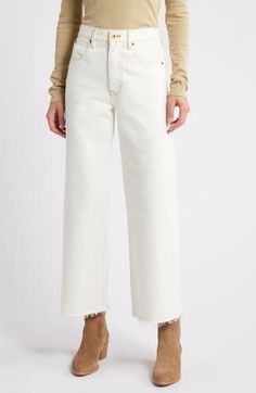 Goldtone hardware and contrast stitching elevate kicky wide-leg jeans that have frayed raw hems for added style points. 27" inseam; 22" leg opening; 12" front rise; 16" back rise (size 29) Zip fly with button closure 100% cotton Machine wash, tumble dry Made in the USA of imported fabric Wide-leg Cotton Jeans With Frayed Hem, White Straight Leg Jeans With Contrast Stitching, High Rise Flare Jeans With Contrast Stitching For Spring, Cotton Flare Jeans With Contrast Stitching, Cropped Leg, Spring Wide-leg Bottoms With Contrast Stitching, High Waist Flare Jeans With Frayed Hem For Work, Chic Flare Jeans With Frayed Hem For Work, Wide Leg Pants With Contrast Stitching For Spring, Chic Spring Pants With Contrast Stitching