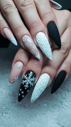 Elevate your nail game with this frosty elegance nail art! The mix of soft nude, glossy white, and bold black creates a striking contrast, while intricate snowflake designs and a textured white nail bring a touch of winter magic. Perfect for holiday parties or a chic winter look, this design is sure to turn heads. Try it out for a trendy update to your winter wardrobe!
#nailsdesign #acrylicnails #winternails #nailsinspo #decembernails