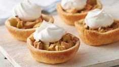 mini pies with whipped cream on top