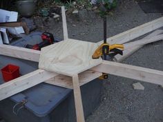 the tools are sitting on top of the wooden planks and ready to be used