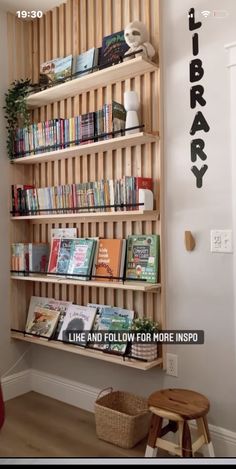 a wooden book shelf with books on it