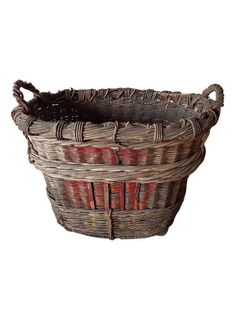 an old woven basket is shown on a white background with the word love written in red