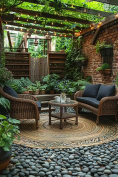 an outdoor patio with two wicker chairs and a coffee table on a rug in the middle