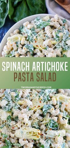 spinach artichoke pasta salad in a white bowl on top of a blue table