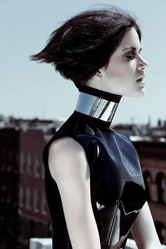 Metallic accents. Strong monochrome. Urban background. Glossy patent silhouette. Silver toned skin. Cyberpunk Mode, Dark Fashion, Costume Design, Alexander Wang