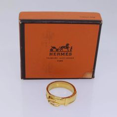 Hermes Scarf Ring Metal Gold Auth Item Description Brand Hermes Color Gold Material Metal Size(Cm) W2.2cm X H2.2cm(Approx) Size(Inch) W0.9 X H0.9inch(Approx) Style Charm Accessory Item Box Made In France Serial No. - Rank B Condition Outside Surfaceslight Scratches Inside - Pocket - Corner - Odor No Offensive Odor To Us. Rank Rank Items With The Grading S Or Sa Are As Close To New As You Can Get. Usually They Are Either New Old Stock Or Have Only Been Used A Couple Of Times. You Will Find It Ver Hermes Scarf Ring, Hermes Jewelry, Scarf Rings, Hermes Scarf, Gold Material, Metal Rings, Womens Jewelry Rings, Women Jewelry, Paris