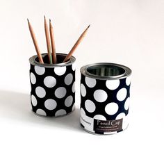 a black and white polka dot can with pencils in it