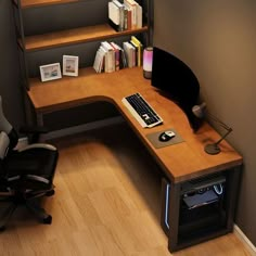 a computer desk with a keyboard, mouse and monitor on it next to a bookshelf