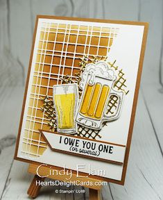 a card with two mugs of beer on it