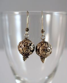 antique cast tibetan silver beads earrings with 925 silver hooks 1,4 cm size beads Traditional Silver Beaded Earrings For Pierced Ears, Sterling Silver Earrings With Silver Beads, Traditional Silver Nickel-free Beaded Earrings, Silver Spiritual Brass Earrings, Spiritual Silver Brass Earrings, Traditional Silver Round Bead Earrings, Traditional Sterling Silver Beaded Earrings, Nickel Free, Nickel-free Traditional Sterling Silver Beaded Earrings, Nickel-free Sterling Silver Traditional Beaded Earrings