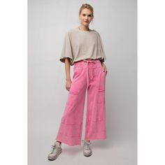 Lazy Days Mineral Washed Wide Leg Pants in Barbiie Pink The comfiest and trendiest wide-leg pants just hit the scene! Say "Yes" to a wide-leg silhouette with a draw-string waist in soft French Terry. Vintage fade makes these a casual favorite while visible seams, full-length raw-edges, and outline pockets add to the relaxed vibe. Shorter gals look no further, these are an awesome crop style that will make the perfect full-length pants for you!  Item Deets:  Waist laid flat: (S) 14" (M) 15" (L) 16" - With TONS of stretch! Inseam: 24" Rise: 14" 100% cotton Size Chart Small: 0-8 Medium: 8-12 Large: 12-16 Brand: Easel Shop all your favs + all the new at shoppoppyandseed.com + receive 15% off your first order! ❤ Return Policy: Even Exchange or Store Credit only within 7 days of delivery. Trendy Wide Leg Sweatpants For Fall, Spring Trendy Wide-leg Parachute Pants, Trendy Wide-leg Sweatpants For Fall, Trendy Pink Wide Leg Parachute Pants, Wide Leg Pants For Day Out, Spring Wide Leg Loungewear Sweatpants, Wide Leg Spring Loungewear Sweatpants, Wide-leg Spring Loungewear Sweatpants, Pink Wide Leg Bottoms For Fall