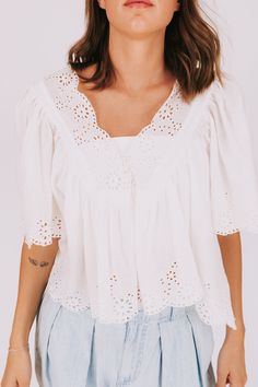 Get ready to make a statement in our FREE PEOPLE Costa Eyelet Top! With its deep v-neckline and eyelet embroidery, this top offers a playful and loose fit. Perfect for adding a touch of fun and quirkiness to any outfit. Details Deep v-neckline Eyelet embroidery Loose fit Sizing Approximate measurements: SIZE LENGTH BUST Small 21" 50" Medium 22" 54" Large 24" 56" XLarge 25" 60" Fabric has no stretchModel is 5’8 wearing small Material 100% CottonHand wash coldHang to dry Casual V-neck Eyelet Blouse, Spring Cotton Lace Top With V-neck, Cotton Eyelet V-neck Top, Spring V-neck Tops With Broderie Anglaise, Feminine V-neck Lace Top For Day Out, Chic White V-neck Embroidered Top, V-neck Lace Top For Brunch, Summer V-neck Top With Eyelet Detail, Spring Eyelet V-neck Top