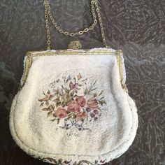 (eBay) Antique Micro-Beaded Victorian Floral Tapestry Purse Bag Clutch Metal. Approx 6 x 6 1/2 Please see photos for more accurate description and condition. Has some discoloration, did not try to clean. Victorian Era Objects, Cottage Core Purse, Handmade Tapestry Evening Bags, Handmade Tapestry Bags For Evening, Formal Embroidered Tapestry Bag, Vintage Embroidered Tapestry Shoulder Bag, Embroidered Tapestry Rectangular Shoulder Bag, Embroidered Tapestry Bag In Rectangular Shape, Vintage Beaded Bag