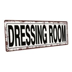 a sign that says dressing room on it