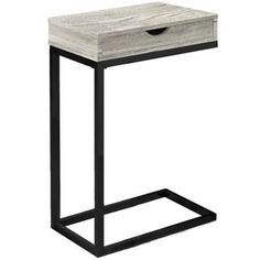 an end table with a drawer on the top and metal frame around it, against a white background