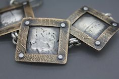 "This bracelet is handmade from fine silver, bronze, and alloy rivets. A variety of real North Carolina fall leaves were used to imprint the fine silver back plates. Bronze was then textured, kiln fired, pierced, sawed and riveted to the silver back plates. Heavy gauge handmade sterling jump rings are then soldered to the back plates, and used to connect the individual pieces. Made to size, and finished with a handmade sterling clasp. This is truly a unique bracelet with some great weight, it is Rivet Jewelry Ljbjewelry Metalsmith, Silver Hammered Brass Bracelets, Hammered Silver Brass Bracelets, North Carolina Fall, Rivet Jewelry, Mixed Metal Bracelet, Bracelet For Him, Hummingbird Jewelry, Mixed Metal Bracelets