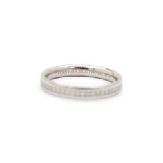 Brand: Tiffany & Co.  Gender: Ladies  Material: 18K White Gold  Size: 6  Shank Width: 0.34 mm  Weight: 2.84 Grams  Ladies 18K white gold diamond wedding band with a half-round shank.  Engraved with "750". The "Tiffany & Co." trademark (or hallmark) can also be found on the item.  Pre-owned in excellent condition. Might show minor signs of wear.  Channel Set in 18 Karat White Gold with:  One (1) round brilliant cut natural diamond:  Carat Weight: 0.340 ct. Color: E - F Clarity: VS1 - VS2 Cut: Ver Luxury White Gold Band With Brilliant Cut, Luxury White Gold Bands With Brilliant Cut, Classic Platinum Band With Brilliant Cut, Classic Platinum Bands With Brilliant Cut, Timeless White Gold Wedding Bands, Brilliant Cut White Gold Platinum Bands, Brilliant Cut Platinum Bands In White Gold, Platinum White Gold Bands With Brilliant Cut, Timeless White Gold And Platinum Wedding Ring