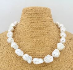 ♥Details:♥Metal: Freshwater pearl, baroque  pearl beads♥Model:SPN25♥ Pearl Size(actual size): 14-15mmx18-23mm  (Approx)♥Necklace  length:17 Inches,18Inches，20Inches,22Inches,25Inches,30Inches，34InchesIf you need other special size, please tell me. ♥ Pearl Shape:baroque♥ Color:white♥ Pearl skin: clean, with little flaws ♥ Grade(my shop): AAA♥ Pearl luster: good♥ Body: please look at picture♥ Clasps style( silver /glod/rose glod plated): please choose♥All measurements approximate♥Edison pearl bead White Baroque Pearl Necklaces, White Baroque Pearl Necklace Gift, Elegant Baroque Pearl White Pearl Necklace, White Baroque Pearl Necklace With Charm, Elegant Baroque Pearl Necklace In Pearl White, Luxury Elegant Baroque Pearl Beaded Necklaces, White Baroque Pearl Necklace With High Luster, Elegant White Baroque Pearl Necklace, Baroque Pearl Jewelry