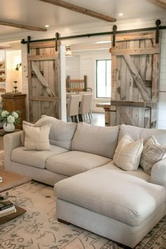 a living room filled with furniture and decor