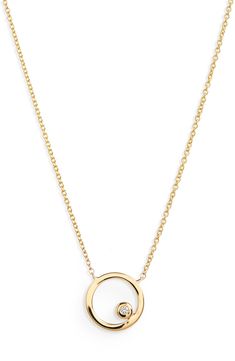 This 14-karat-gold necklace features an open disc pendant glinting with a single bezel-set diamond. 16" length; 2" extender; 1/4" pendant diameter Total diamond weight: 0.01ct. Color: G-H Clarity: SI 14k gold/diamond Imported >Diamond Guide 14k Gold Solitaire Necklace With Cable Chain, Formal Solitaire Necklace With Round Pendant And Cable Chain, Modern Diamond Necklace With Delicate Chain, Modern Initial Pendant Necklace With Polished Finish, Modern Polished Initial Pendant Necklace, Formal Full Circle Yellow Gold Jewelry, Yellow Gold Open Circle Jewelry With Adjustable Chain, 14k Yellow Gold Open Circle Necklace, Minimalist Polished Diamond Necklace