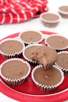 chocolate cupcakes with frosting on a red plate