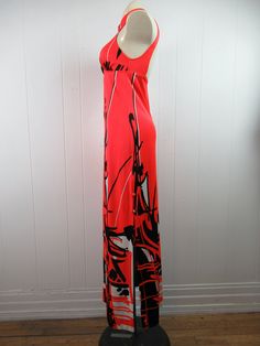 "Vintage 1960s early 70s maxi dress. Made of polyester. Color is red, black and white. Asian inspired. Has a halter style collar with three buttons. Empire waist. Floor length. Made by Jantzen. Size medium. Actual measurements are: 25\" (stretches to 29\") around the waist 32\"(stretches to 36\") around the hips 60\" overall length 29.5\" side vents In very good condition." Red Fitted Lined Maxi Dress, Fitted Red Lined Maxi Dress, Fitted Lined Red Maxi Dress, Red Full-length Maxi Dress For Summer, Red Fitted Sundress Maxi Dress, Fitted Red Sundress Maxi Dress, Red Halter Neck Maxi Dress For Spring, Red Sleeveless Lined Maxi Dress, Retro Fitted Sleeveless Maxi Dress