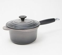 a pot with a lid and handle on a white background