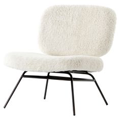 an upholstered white chair with black legs