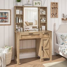 a wooden desk with a mirror and shelves on it in front of a white wall