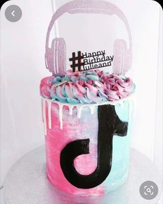 a birthday cake with headphones on top