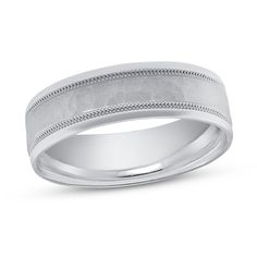 men's wedding band in white gold with engraved design on the outside and inside