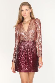 Give your party-wear a fresh spin in this twist-front sequin ombre mini dress. Coated in all-over shimmering sequin ombre embellishments, this long-sleeve plunge dress hugs your curves and gathers front-and-center with a knotted twist design. A hidden back zipper brings this dazzling dress together. Sequin mini dress Long sleeves Ombre Mini Twist front Lined Length: 33 1/2" Chest: 16 1/4" Waist: 13 7/8" Low hip: 18" Self: 100% Polyester Lining: 100% Polyester Hand wash in cold with similar color Dazzling Dress, India Dress, Dress Party Night, Eve Dresses, New Years Eve Dresses, Plunge Dress, Holiday Party Dresses, Gala Dresses, Sequin Mini