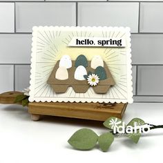 a card with three little birds on it and the words hello spring written in white