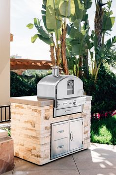 an outdoor bbq grill on a patio