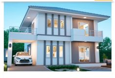 a white car parked in front of a two story house