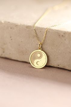 Gold Moon And Sun Pendant - Moon And Sun Gold Necklace ● Material of pendant: Solid Gold 14k ( REAL GOLD ) ● Metal Stamp: 14k ( REAL GOLD ) ● The pendant is available in 5 sizes: - 12,7 mm / 0.5 inches (Diameter) - 14,0 mm / 0,55 inches ( Diameter ) In the photos - 15,3 mm / 0.6 inches ( Diameter ) - 16,5 mm / 0,65 inches ( Diameter ) - 19,1 mm / 0,75 inches ( Diameter ) ( In the photos the size is 14mm / 0.55 inches Diameter ) ( Jump Ring inner diameter: 4 mm ) ● Material of chain: Solid gold 1 Moon And Sun Pendant, Gold Moon-shaped Engraved Necklace, Gold Moon Charm Necklace With Sun And Moon Design, Gold Moon Charm Necklace In Celestial Style, Celestial Yellow Gold Charm Necklaces With Moon Phase, Gold Moon Charm Necklace, Celestial Style, Gold Moon-shaped Celestial Charm Necklace, Yellow Gold Moon Charm Jewelry, 14k Gold Jewelry With Moon Phase Detail