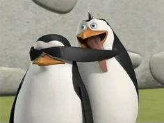 a penguin with its mouth open and tongue out, standing in front of another penguin