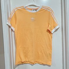 Nwt Xs Oversize Hazy Orange Casual T-shirt With Three Stripes Branding For Spring, Summer Crew Neck Top With Three Stripes Branding, Summer Three Stripes Crew Neck Tops, Summer Short Sleeve Tops With Three Stripes Branding, Summer Tops With Three Stripes Short Sleeve, Summer Short Sleeve Tops With Three Stripes, Orange Sporty T-shirt For Spring, Casual Three Stripes Top For Summer, Casual Summer Tops With Three Stripes