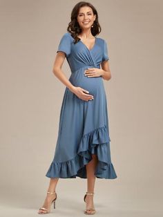 Step into motherhood in style with this stunning Ruffles High Low Hemline V-Neck dress, designed to make you feel like the goddess you are. Made with high stretch material to accommodate your growing bump, this dress features beautiful ruffle detailing and a contemporary high-low hemline that exudes sophistication and elegance. Make a statement at your next formal event or photo shoot and feel confident and chic in this fabulous maternity dress! Spring Maternity V-neck Dress Nursing Friendly, Elegant Fitted V-neck Maternity Dress, Maternity Dress With Surplice Neckline, Spring Maternity Dress V-neck Nursing Friendly, Spring Maternity Dress With Nursing Friendly V-neck, Spring V-neck Nursing Friendly Maternity Dress, Fitted Maternity Dress With Surplice Neckline, Elegant Nursing Friendly V-neck Dress, Summer V-neck Maternity Dress Nursing Friendly