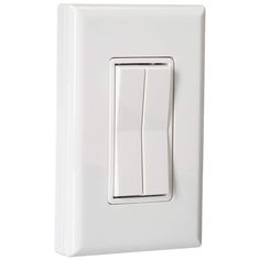 a white light switch on a white background