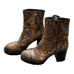 Brand: AEROSOLES Style: BOOTS ANKLE HEELS Color: ANIMAL PRINT Size: 7.5 SKU: 103-103336-5037 CONDITION: GENTLY USED Fall Snake Print Ankle Boots, Snake Print Heeled Boots With Round Toe For Fall, Brown Snake Print Ankle Boots, Fall Round Toe Heeled Boots With Snake Print, Fall Snake Print Round Toe Heeled Boots, Fall Snake Print Heeled Boots With Round Toe, Fall Season Snake Print Heeled Boots With Round Toe, High Heel Snake Print Boots For Fall, Snake Print High Heel Boots For Fall