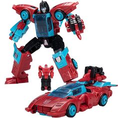 a red and blue toy car next to an action figure in the shape of a transformer