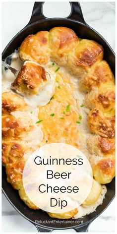 guinness beer cheese dip in a cast iron skillet with text overlay that reads guinness beer cheese dip